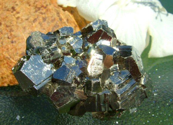 Pyrite Pyrite is a shiny yellowish metallic crystal also known as Fool's Gold.