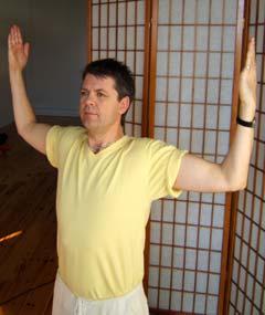 Inhale - Raise your elbows to form a horizontal line with your shoulders. 5.