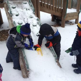 Some went sliding down an iced slide, some worked really hard trying to remove the iced snow off of the equipment, while