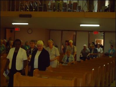 The Delegates processed into the chapel with Sister Marlene Bosch, her friend Kate McDonald, along with Sisters Trinh Ta, Denise Turcotte, Becky Do, Élodie Guiré who graced the procession with a