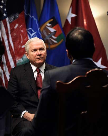 Defense Secretary Robert Gates told reporters, while traveling to Kabul for talks with Karzai, that Iran was playing a double game in Afghanistan.