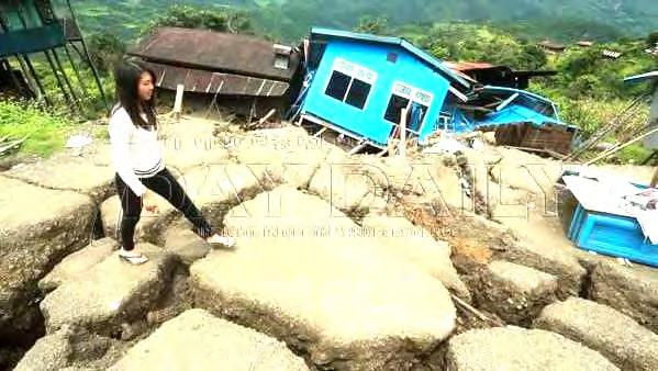 Landslide destroyed roads and bridges.