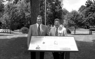 182 Mormon Historical Studies Robert S. Clark and Fred E. Woods at the dedication of the Mormon historical marker at Triangle Park, Keokuk, Iowa, 28 June 2003.