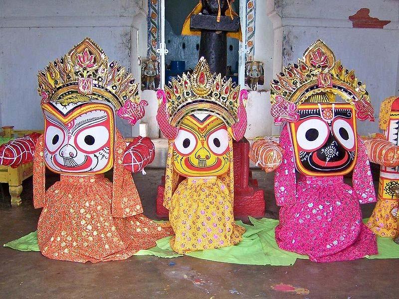 Name and titles Krishna as Jaganatha in a typical Oriya style, shown at the far right, with sister Subhadra in the center and brother Balarama on the left.