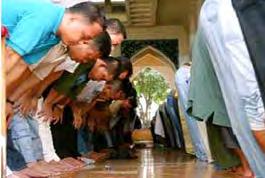 The Friday noon prayer is ideally performed with others,