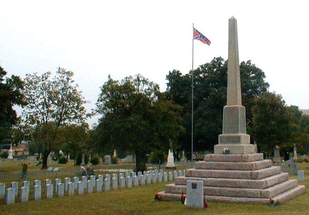 The Confederate Battle Flag flies over the Confederate marker and burial markers in Elmwood Cemetery in Charlotte. Then it was over.