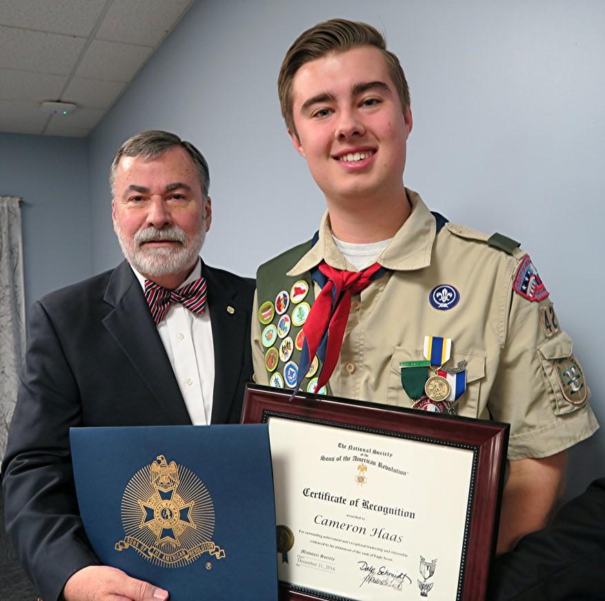Howard Fisk presented Eagle Scout Haas with a Missouri Society Certificate of Recognition. L-R: J.