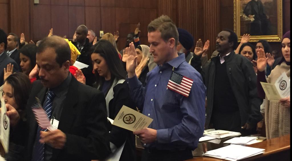 welcomed 67 new US citizens. The Honorable Michael R. Barrett presided.