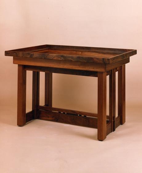 Chrism Table Stained wood table with casters used primarily for the Chrism Mass but