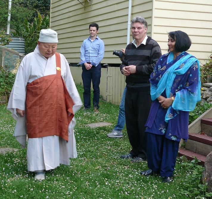 The visit of Venerable Myung Seon Kun Sunim to our Centre Photograph: Venerable Myung Seon Kun Sunim with Anita Carter, Frank Carter and Simon Kearney in front of the Buddha Rupa in our Heavenly
