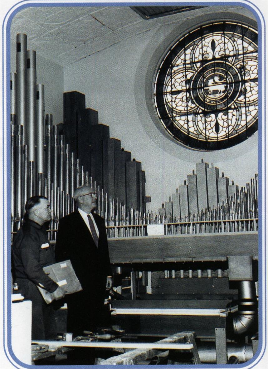 Here we see Martin Johnson, chairman of the organ committee and Reverend Elmer Sahlgren viewing the new instrument during installation.