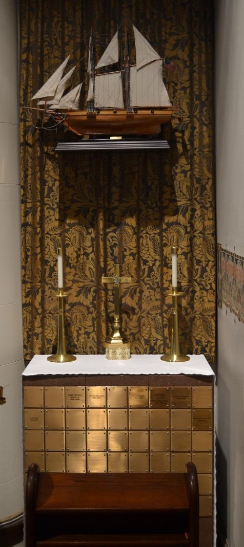 In the center of the Altar reredos is a 4 foot wooden figure of Christ hand carved by Anton Zwang, who was also a player in the Oberammergau festival in Germany.