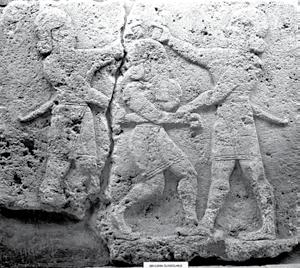 ILLUSTRATOR PHOTO/ DAVID ROGERS/ ARCHAEOLOGICAL MUSEUM/ ANKARA, TURKEY (256/19) Hittite religious scene possibly a man being led by two soldiers to be a human sacrifice; from the Aslani Gate at