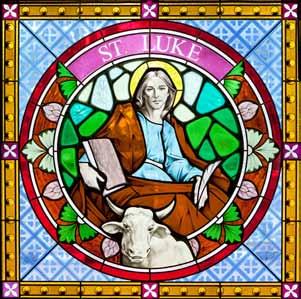 Yong The stained glass windows at the back of the church depict the four evangelists (the writers of