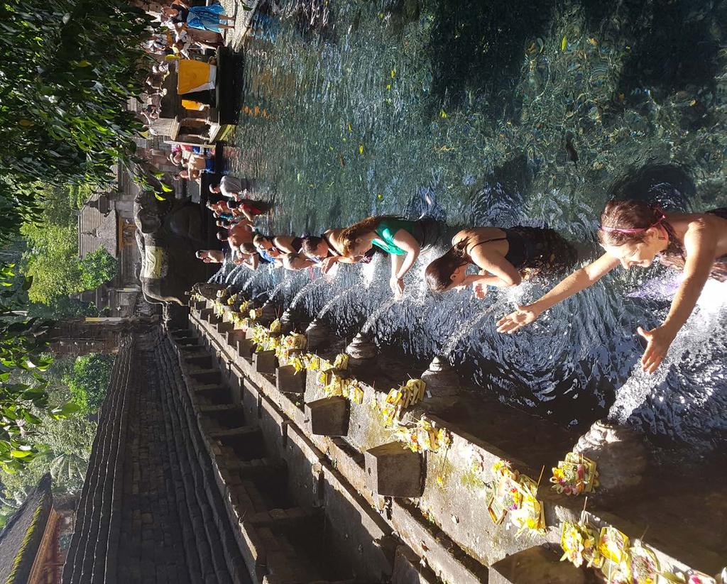 7 SEPTEMBER 19 TH After our morning yoga practice we head to Tirta Empul, a holy temple where the natural hot springs and waterspouts deliver holy water that the Balinese usually collect for their