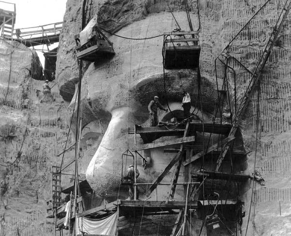 A Tough Job Pays Off Workers carving Abraham Lincoln s face. Other problems had to be overcome when carving Mount Rushmore.