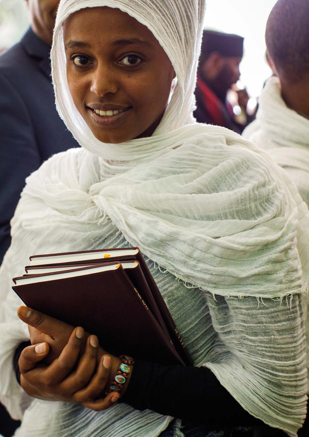 CASE STUDY: ETHIOPIA A young woman welcomes the new version of the Ge ez New Testament, published in 2017.