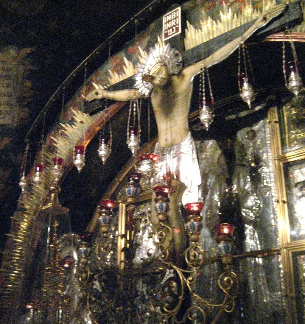 12 th Station: Greek Orthodox Chapel marks the site of the crucifixion Below the altar, on either