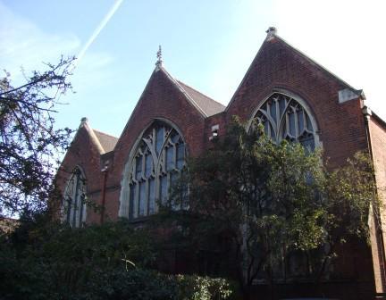 Bucknall, and built in the first decade of the twentieth century to serve the new residential neighbourhood of Manor Park, St Barnabas Church is a Grade II listed building of red brick with stone