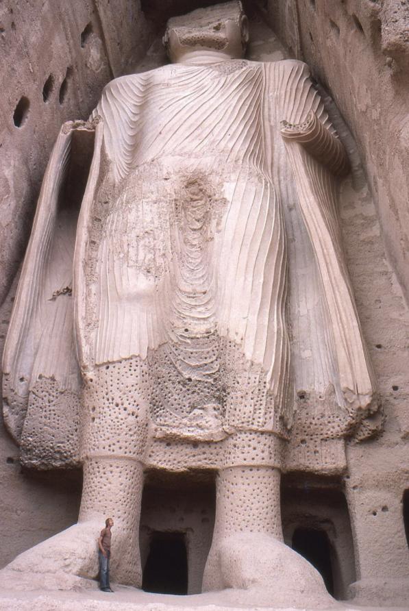 10/23/2017 Syncretism (article) Khan Academy A 1977 photo of one of the Bamiyan Buddhas, showing its Greek dress and sculpture style, as well as damage from previous conquerors of Bamiyan.