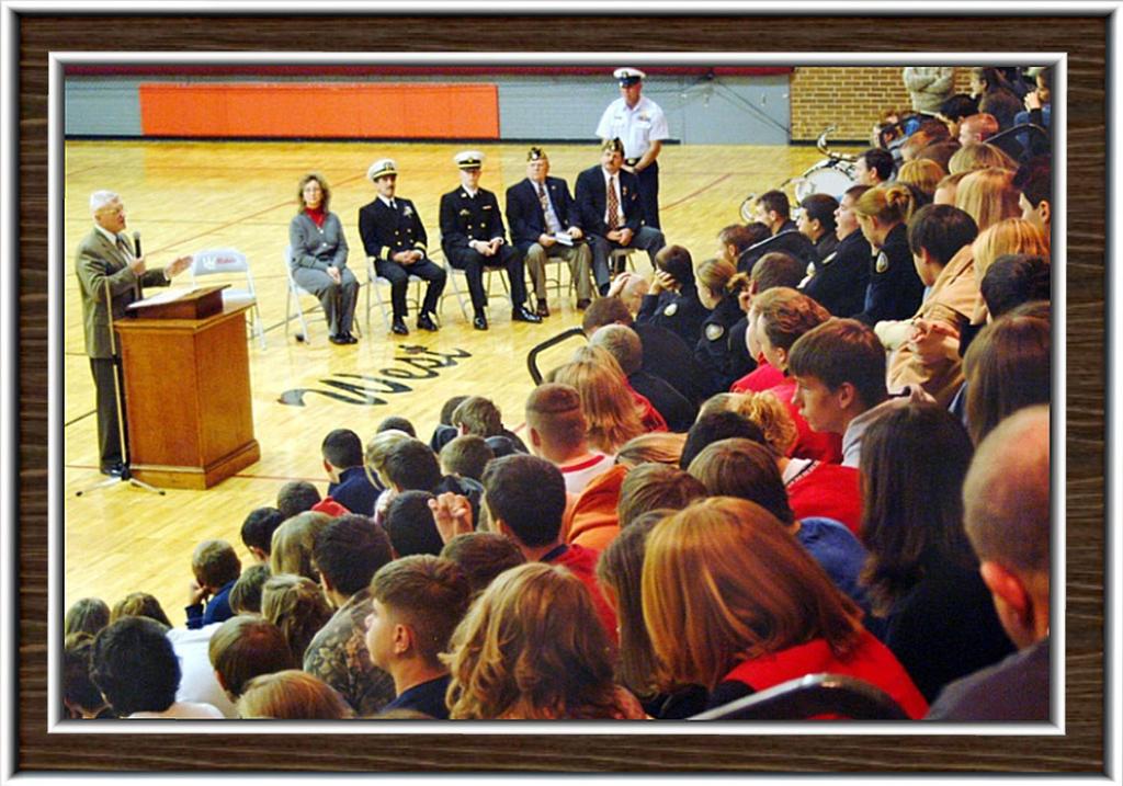 Medal of Honor recipient Wesley Fox (USMC-Vietnam) addresses JROTC students at West Lincoln High School in Lincoln County, NC, during a series of events in December 2004 that