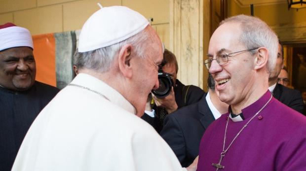 Interfaith encounter: Pope Francis, left, greets Justin Welby, Archbishop of Canterbury, on the occasion of the signing of a joint Declaration of Religious Leaders against Modern Slavery, at the