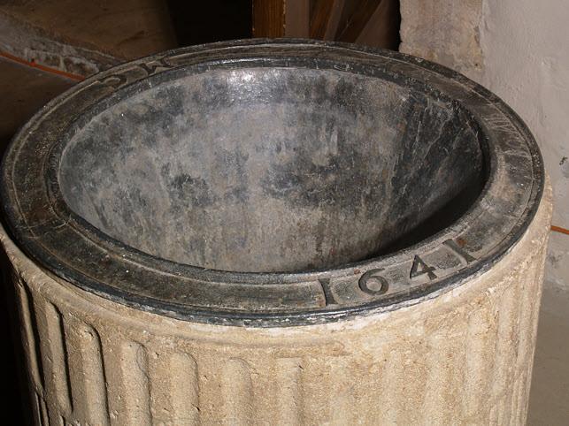 The 16th and 17th Centuries. The font is a 12th or 13th century, fluted bowl design, standing on a cluster of four pillars; again a similarity with the font design in Westwell church.