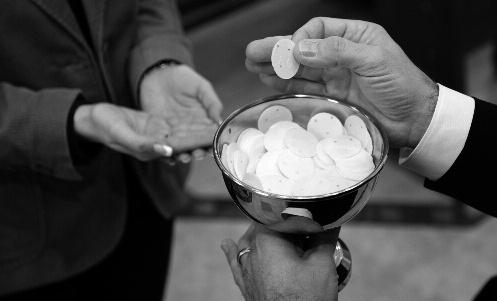 Serving of Holy Communion The wafers are served with the words: "The body and blood of Jesus given for you!