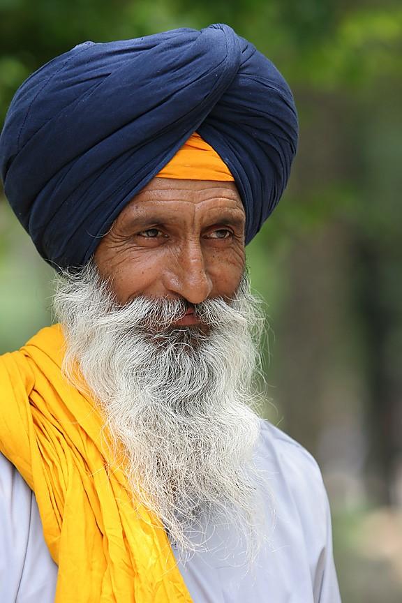 A Sikh is a follower of Sikhism, a monotheistic dharma (a key concept of their faith that believes in one God) which originated during the 15 th century in the Punjab region of the Indian