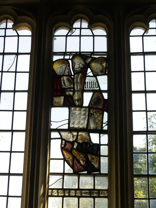 There is little scope for stained glass in St Mary s, Westwell, but a group of sheep farmers had a larger window installed in the south wall and installed a memorial window.
