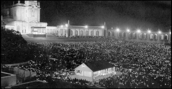 The great esplanade before the Fatima Basilica was filled on May 12, 1967 with people the evening before the Holy Father Pope Paul VI arrived at Fatima. 77 prisonment.