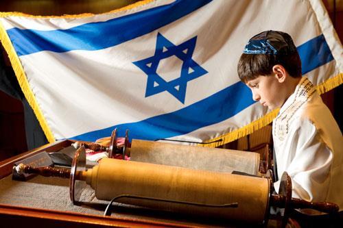 Males lead the service in an Orthodox shul and so reading from the Torah is a way of showing the change in status from a child to an adult.