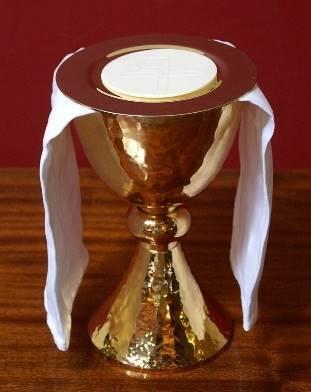 usually given by the Celebrant. HOST: The round piece of unleavened (without yeast) bread used for Mass. The celebrant uses a larger host so that everyone in church is able to see it at Consecration.