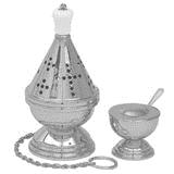 THURIBLE: The metal container that holds the hot charcoal to burn the incense. This is carried by the thurifer in the right hand.
