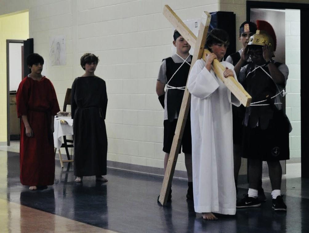 Students engaged in many special activities to celebrate Holy Week. On Sunday, students served at the 11:45 mass and acted out the Passion Play for parishioners.
