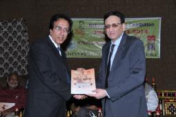 Taj receiving Award