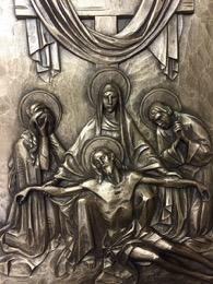 XIII. Thirteenth Station - The body of Jesus is placed in the arms of his mother All you who pass by, behold and see if there is any sorrow like my sorrow.
