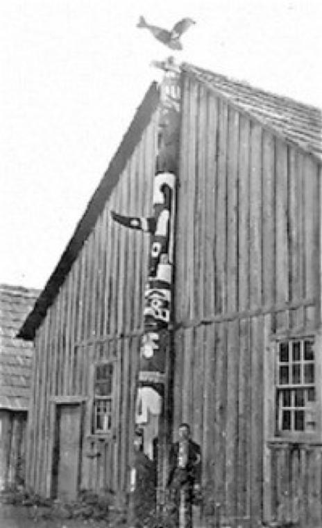 Salish house boards and posts depict mythical creatures associated with family history, notable ancestors, events