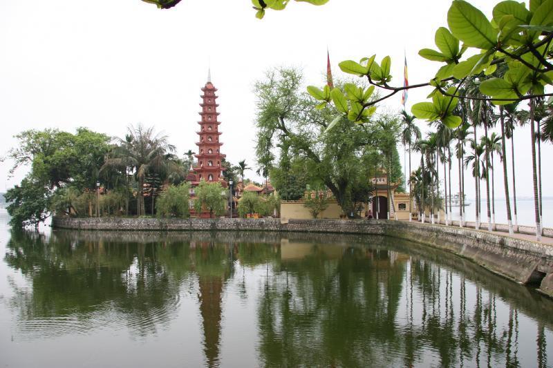 Tay Ho (West Lake) Pagoda, Hanoi. Dedicated to Thanh Mau (Mother Goddess) who appeared as a beautiful girl, recited poetry to a fisherman, and vanished. A popular destination.