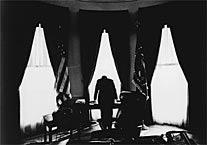 Find the three portraits of John F. Kennedy. Each portrait makes a different statement about the President s feelings. Assign a feeling to each of them.