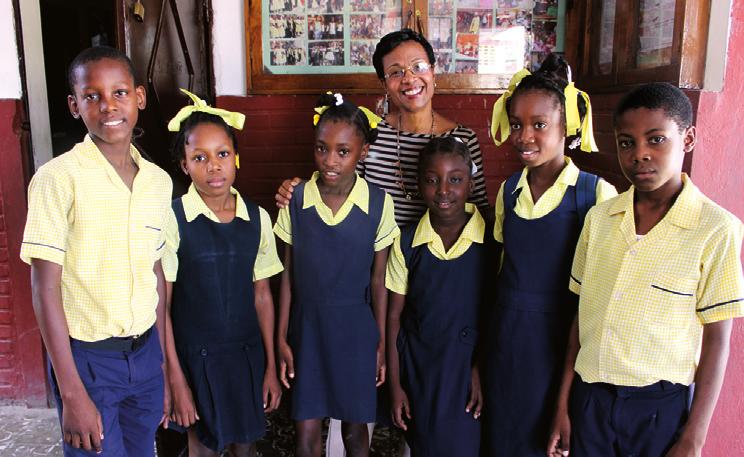 Gladys with students from School of the Good Sower in Port-au-Prince. These children will be eligible to attend C-TECH in the future.