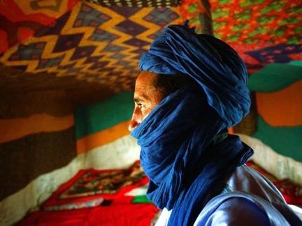 52 Figure 8: A Tuareg in northern Mali wears the veil and head covering in the traditional indigo color. Delay, Jerome. Tuareg Man, Mali.