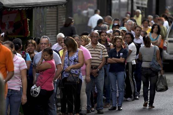 People have to wait in long lines at bus stations, to obtain travel visas,