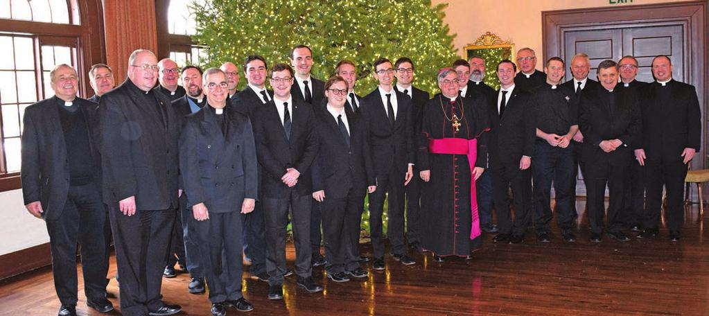 29 while commemorating Christmas with Diocesan seminarians preparing for the priesthood and their pastors. Ten seminarians and four candidates, who will enter St.