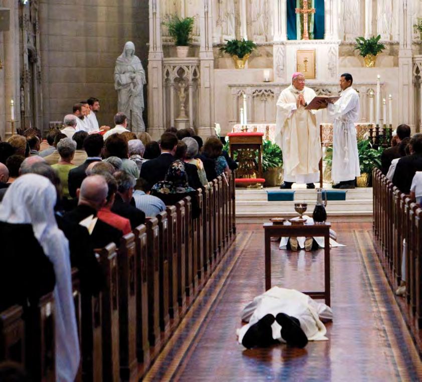 In an ancient act symbolizing humility, obedience, and willingness to live by Christ s example, Kent (closest to the altar) and Mike lay prostrate on the floor in response to Bishop Murry s