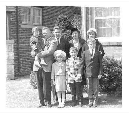 Fr. Kent A. Beausoleil, SJ The Beausoleil family (sans Denice who wasn t born yet) poses in front of their home in Waukegan, IL, before Easter Mass at Immaculate Conception Parish in 1966.