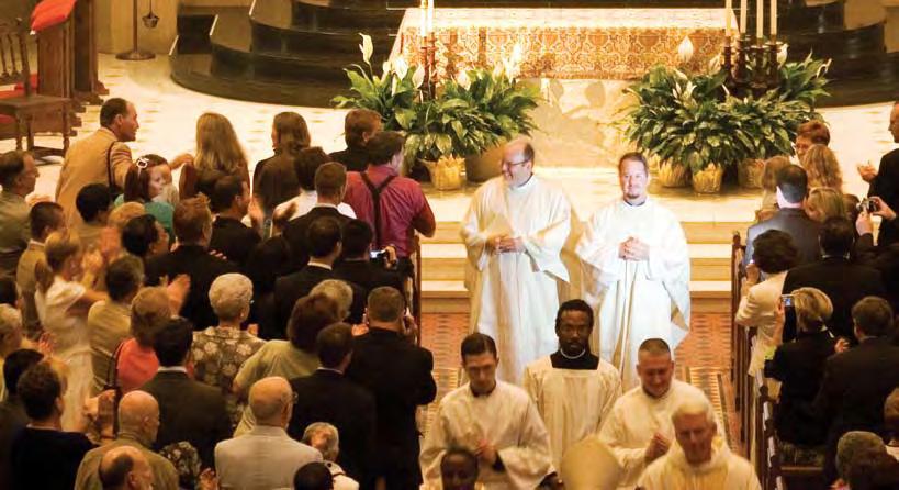 During the ordination liturgy, Kent and Mike participated in the consecration of the Eucharist for the first time and then distributed it to others.