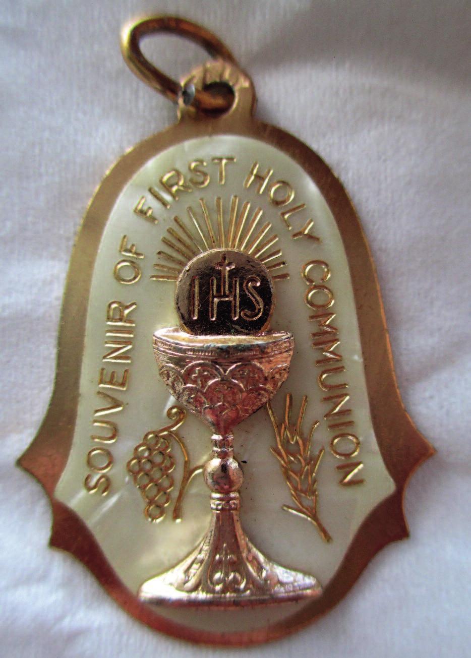 in the life of a Christian. Although it is uncommon today some denominations issued medals to commemorate a person s baptism (Figure 10) and their first Communion.