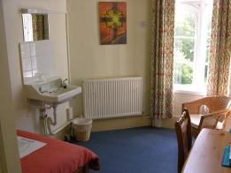 All rooms have a view of nature and some face the Glastonbury Abbey ruins. There is one pay phone available at the house. The rooms are on the 2nd floor and a chair lift, but no elevator is provided.