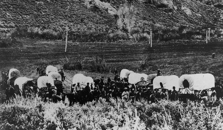 440 PART 3 An Expanding People, 1820 1877 A Mormon Wagon Train What does this view of a Mormon wagon train in the 1850s suggest about the terrain that emigrant families encountered as they went west?